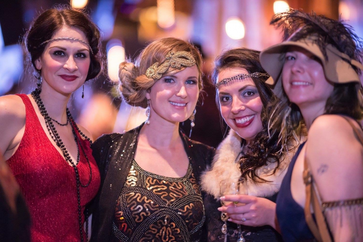 A group a girls dressed in 1920s era clothing at Grapes & Grains festival