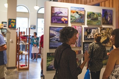 People looking at Art in Touchstones Museum, Nelson during Artwalk 2016. 