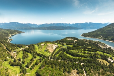 An aerial view of Balfour, BC, including Kootenay Lake and the golf courses.