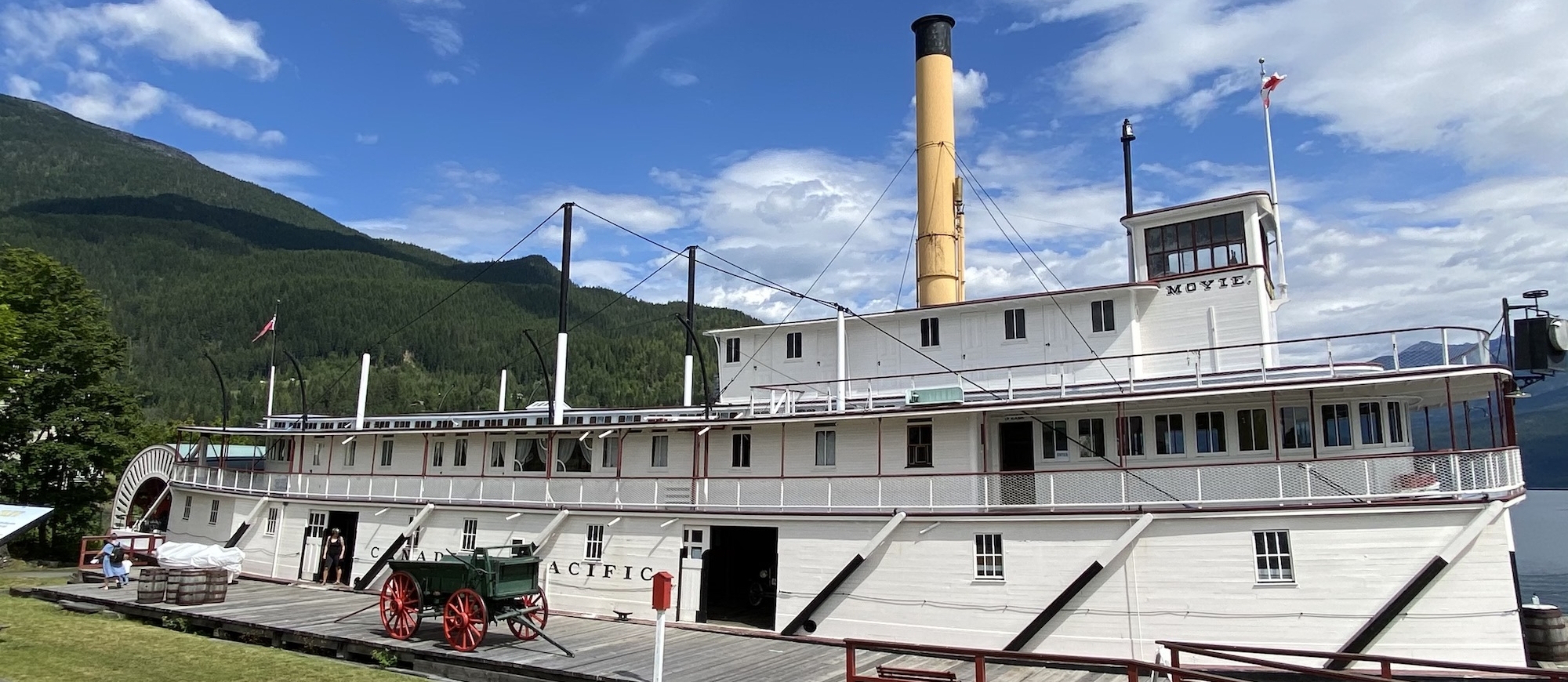 the SS Moyie and Visitor Centre sits with mountains in the background in Kaslo, BC