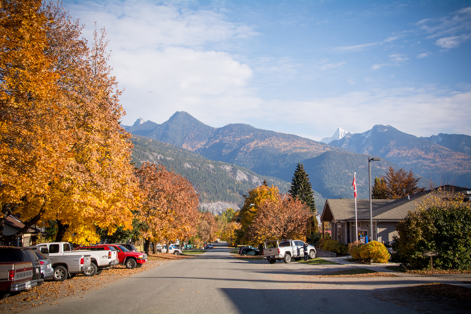 Kaslo BC colourful with vibrant orange trees in the fall.