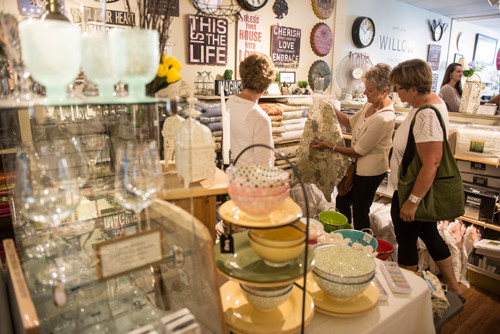 Three ladies in a boutique shop in Kaslo, BC. 