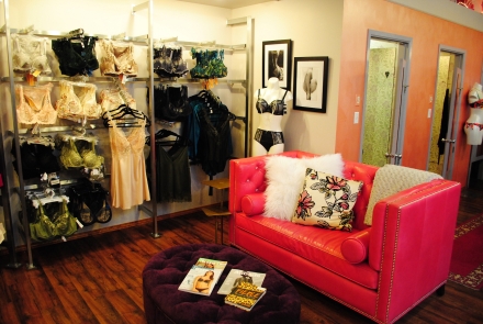 Linderie and a pink leather couch inside the Esprit de la Femme Lingerie shop