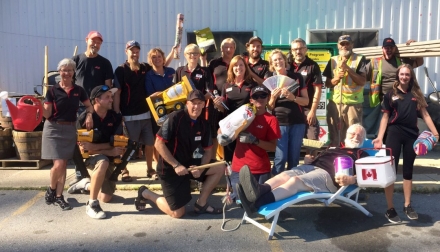 The Kaslo building supplies team being silly for a team photo