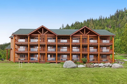 The outside of the Kootenay Lakeview Resort with blue sky in the background.