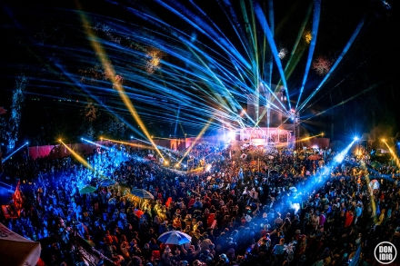 fans fill the dancefloor of the Pagoda Stage as it lights up with blue lazer lights at Shambhala Music Festival