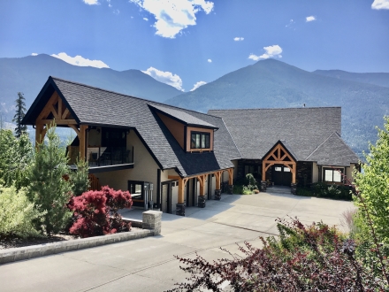 Kootenay wild guest suites with lake and mountains in the background