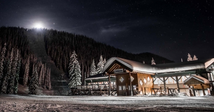 The stars and moonlight light up the Whitewater Ski Resort Lodge at night