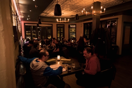 people dining in low lighting at Louie's Steakhouse