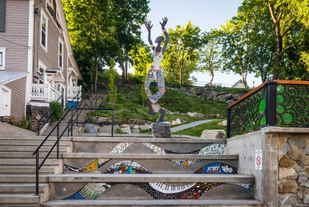 Dancing figure embellished with tile mosaic. 