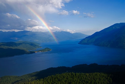 Photo by Steve Ogle, rainbow over Kootenay Lake