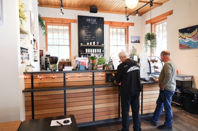 Two People waiting in line inside Railtown Coffeehouse