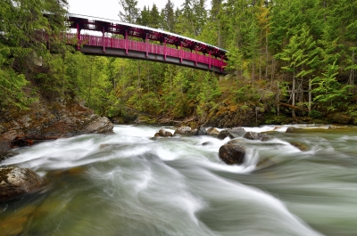 Kaslo River Trail bridge with water flowing below
