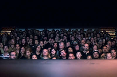 The audience at the Capitol Theatre in Nelson BC looking up at the stage