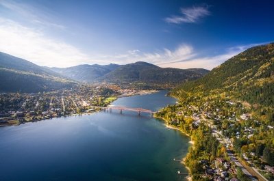 Aerial photo of Nelson, BC in the Fall, looking down the lake to Big Orange Bridge