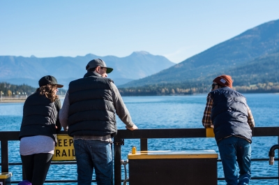 People talking while enjoying the view on one of Kootenay Lake's ferries.