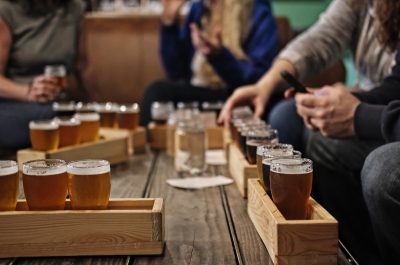 A number of beer flights on a table at Backroads Brewing Co in Nelson, BC.