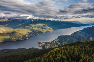 Aerial shot of kaslo and kootenay lake in the summer.