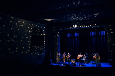 A band playing on stage at the Capitol Theatre in Nelson, BC