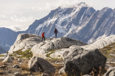 Two hikers at MacBeth Icefield in the Purcell Mountains near Nelson and Kaslo, BC.