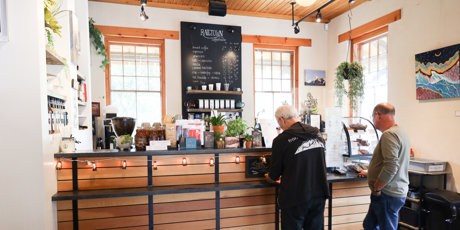 Two People waiting in line inside Railtown Coffeehouse