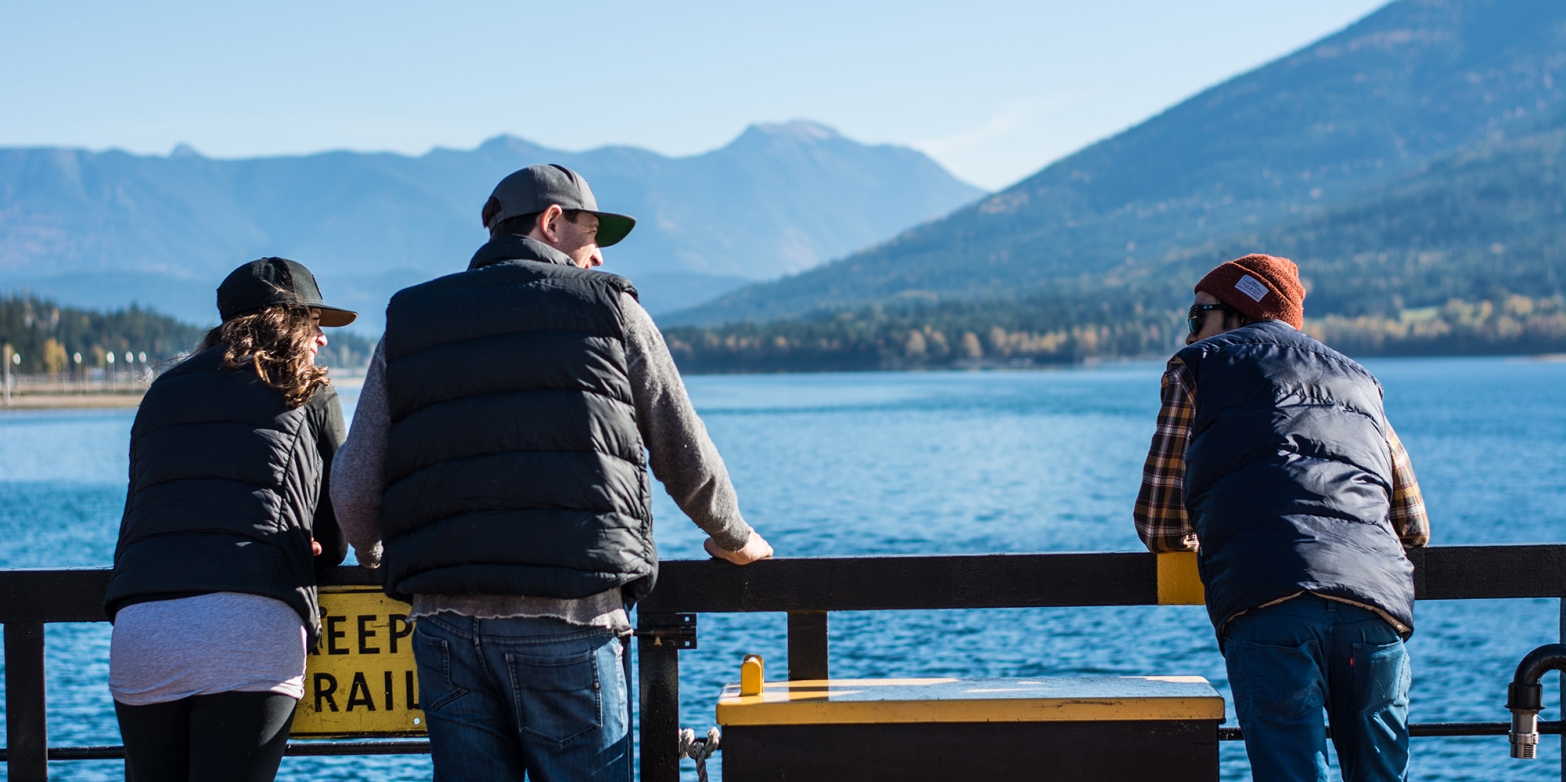 People talking while enjoying the view on one of Kootenay Lake's ferries.