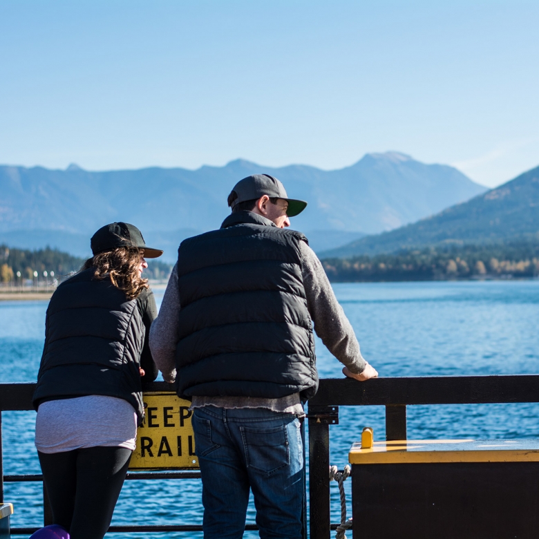 People talking while enjoying the view on one of Kootenay Lake's ferries.