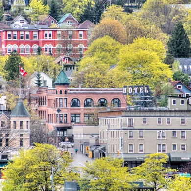 The Hume Hotel and surrounding heritage buildings covered in spring, Nelson, BC
