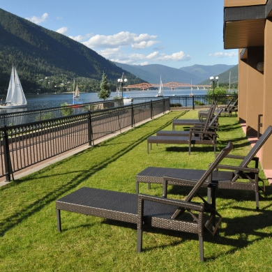 View of the waterfront walk on a sunny day, by the Prestige Lakeside Resort in Nelson BC