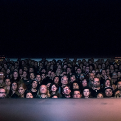 The audience at the Capitol Theatre in Nelson BC looking up at the stage