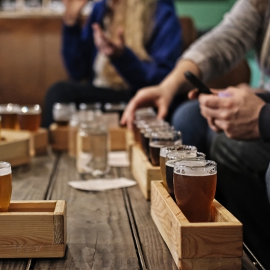 A number of beer flights on a table at Backroads Brewing Co in Nelson, BC.