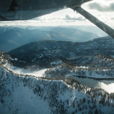 Looking out of an airplane window at Kokanee Glacier Provincial Park