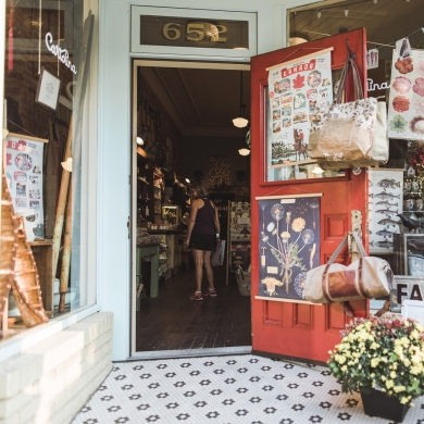 An open door to a downtown Nelson, BC shop: Cartolina on Baker Street