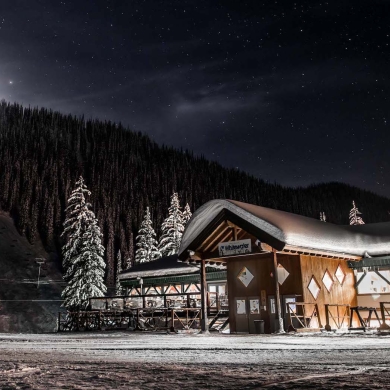 The stars and moonlight light up the Whitewater Ski Resort Lodge at night