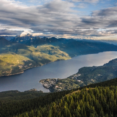 Aerial shot of kaslo and kootenay lake in the summer.