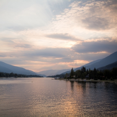 The sun starting to set on Kootenay Lake. View from the Kootenay Lake Ferry just after leaving the Balfour Ferry Terminal