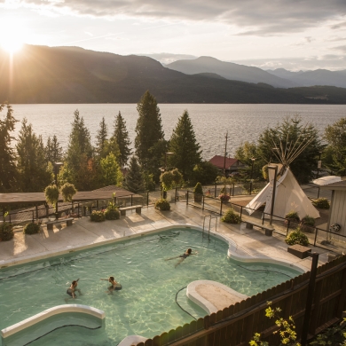 Ainsworth Hot Springs, near Nelson, with the main pool lit by the setting sun.