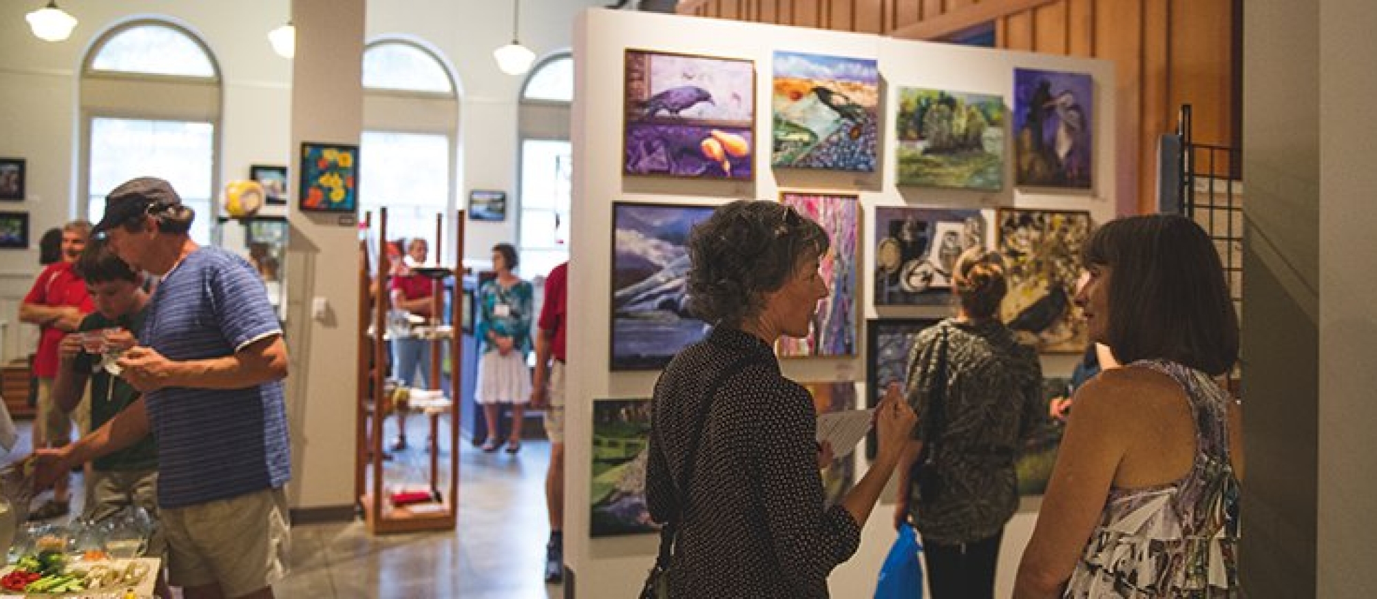 People looking at Art in The Nelson Museum, Archives & Gallery, Nelson during Artwalk 2016. 