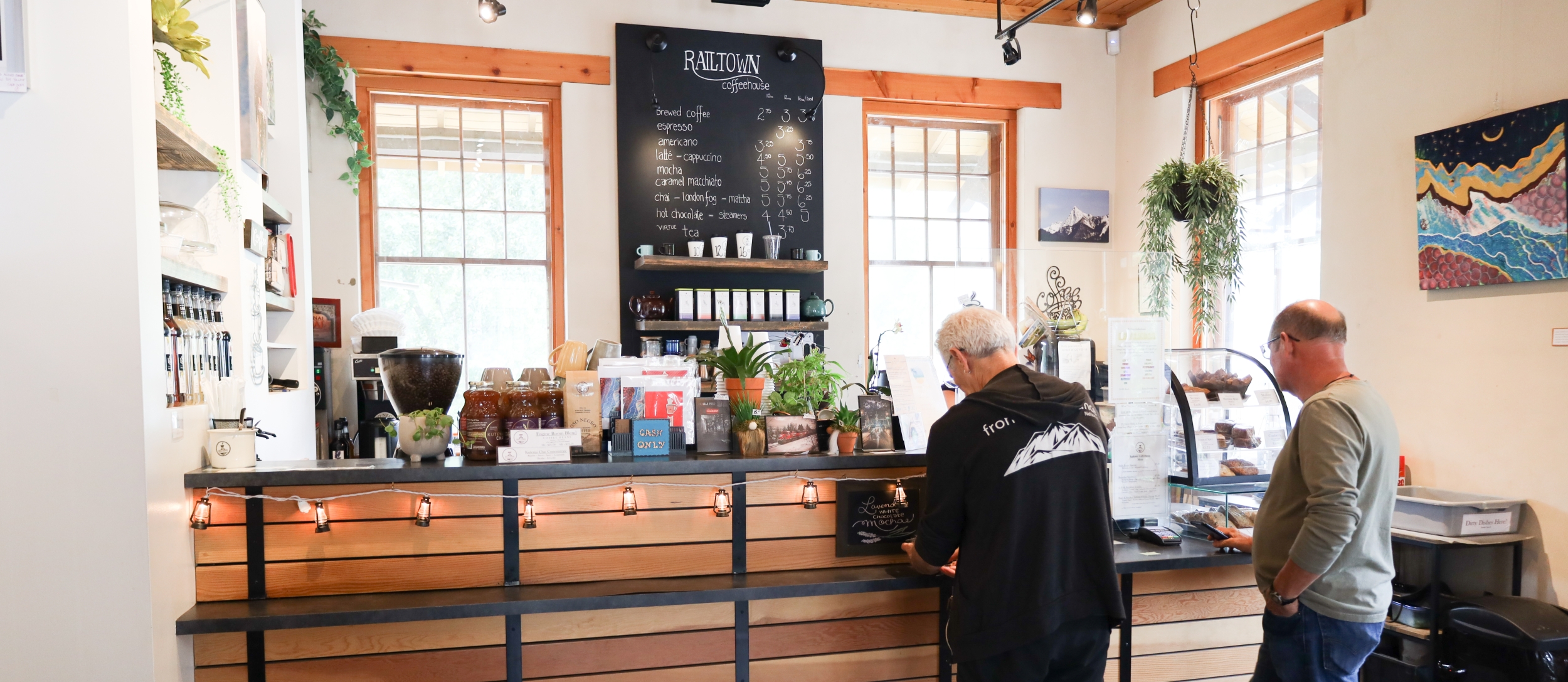 Two People waiting in line inside Railtown Coffeehouse