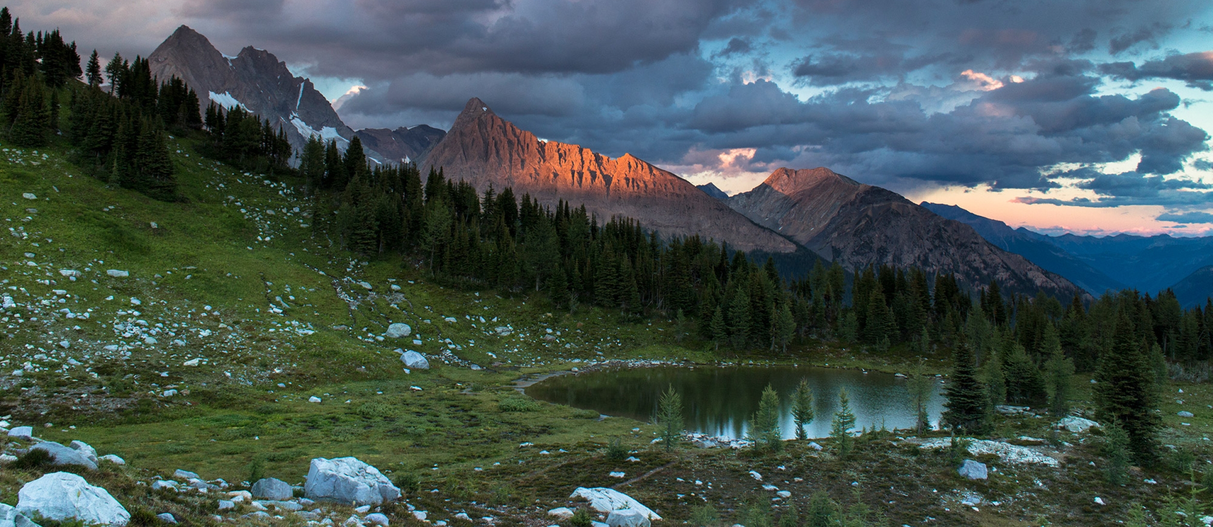 Golden hour on the mountains around Jumbo in the Purcell mountains.