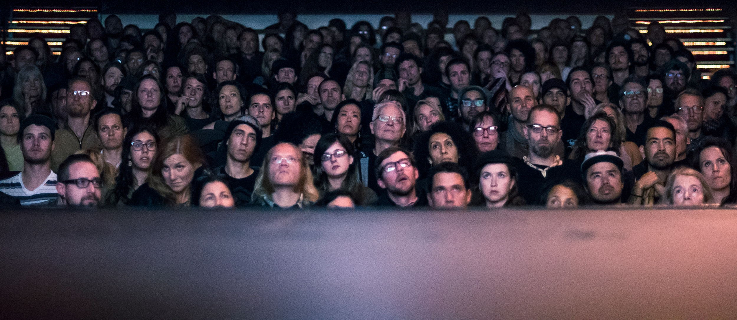 The audience at the Capitol Theatre in Nelson BC looking up at the stage