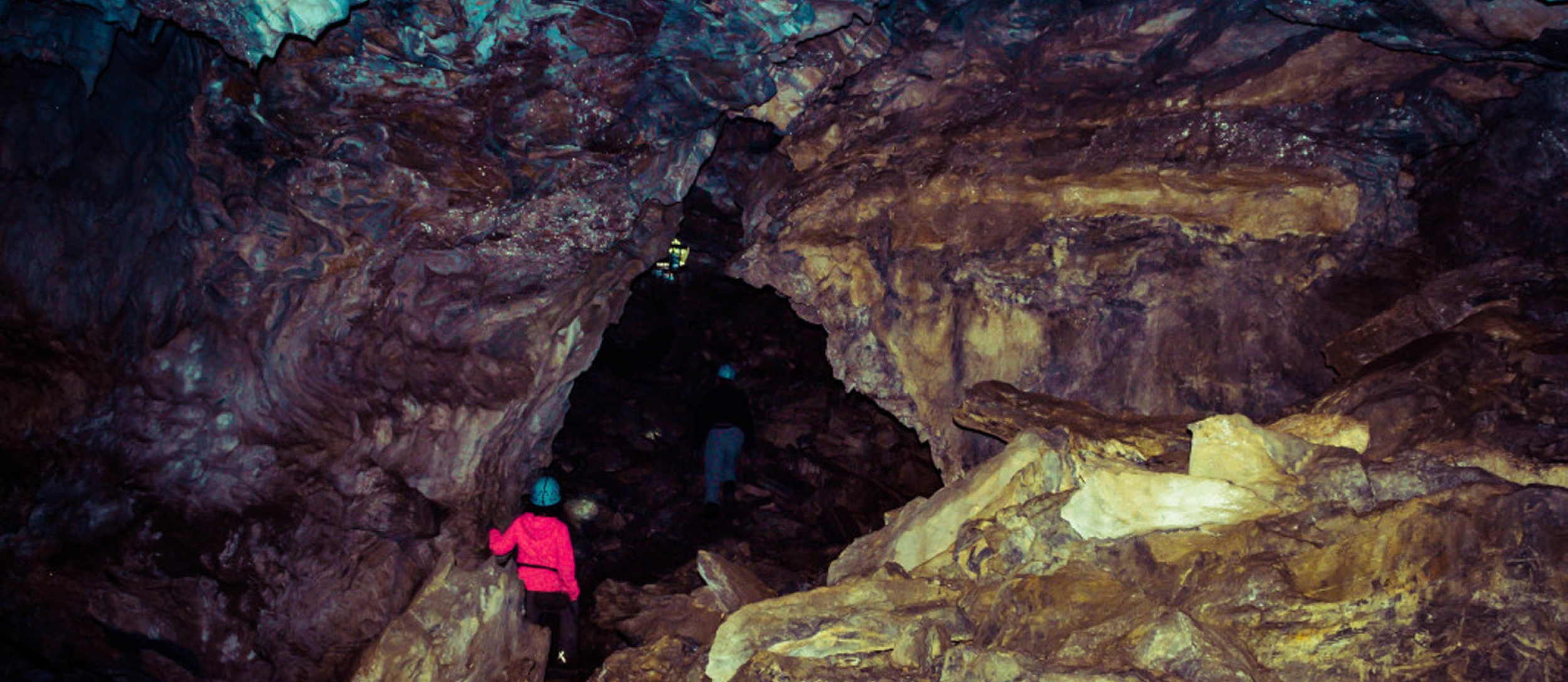 A tour group inside of Cody Caves, near Ainsworth BC.