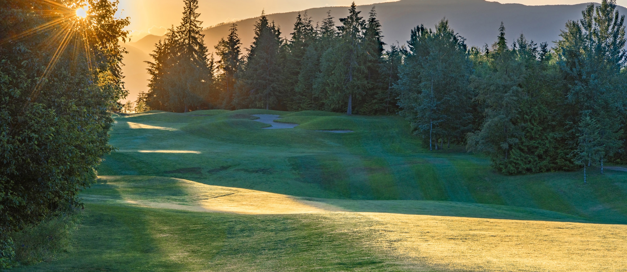 Balfour Golf Course at sunset, a golf course near Nelson BC and Balfour BC.