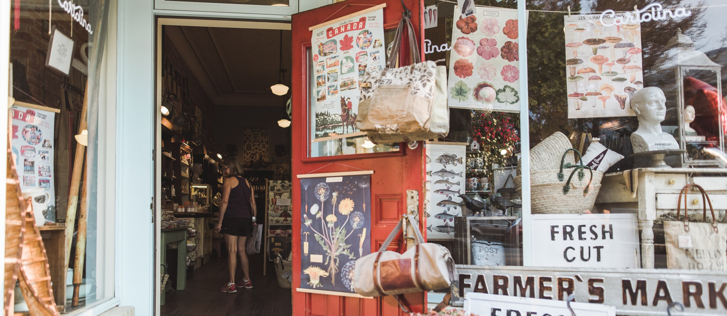 An open door to a downtown Nelson, BC shop: Cartolina on Baker Street