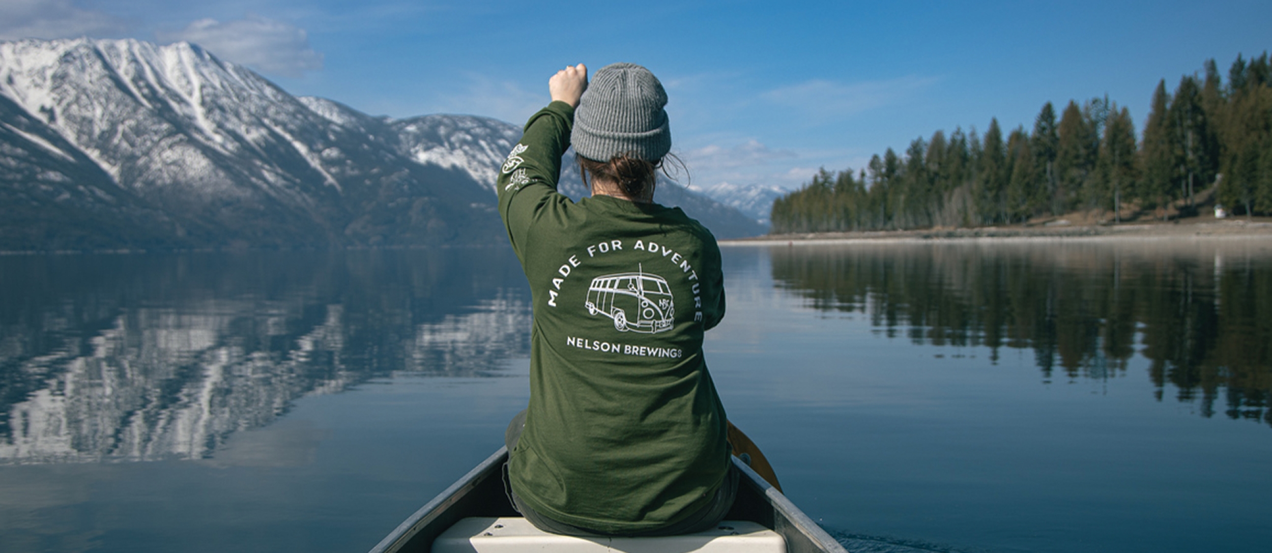 Person canoeing on Kootenay Lake.