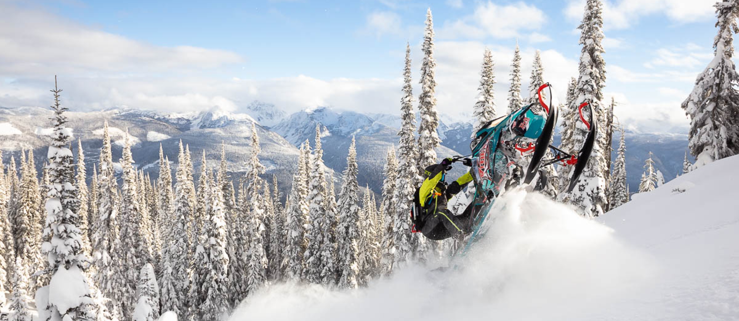 landscape of person on snowmobile