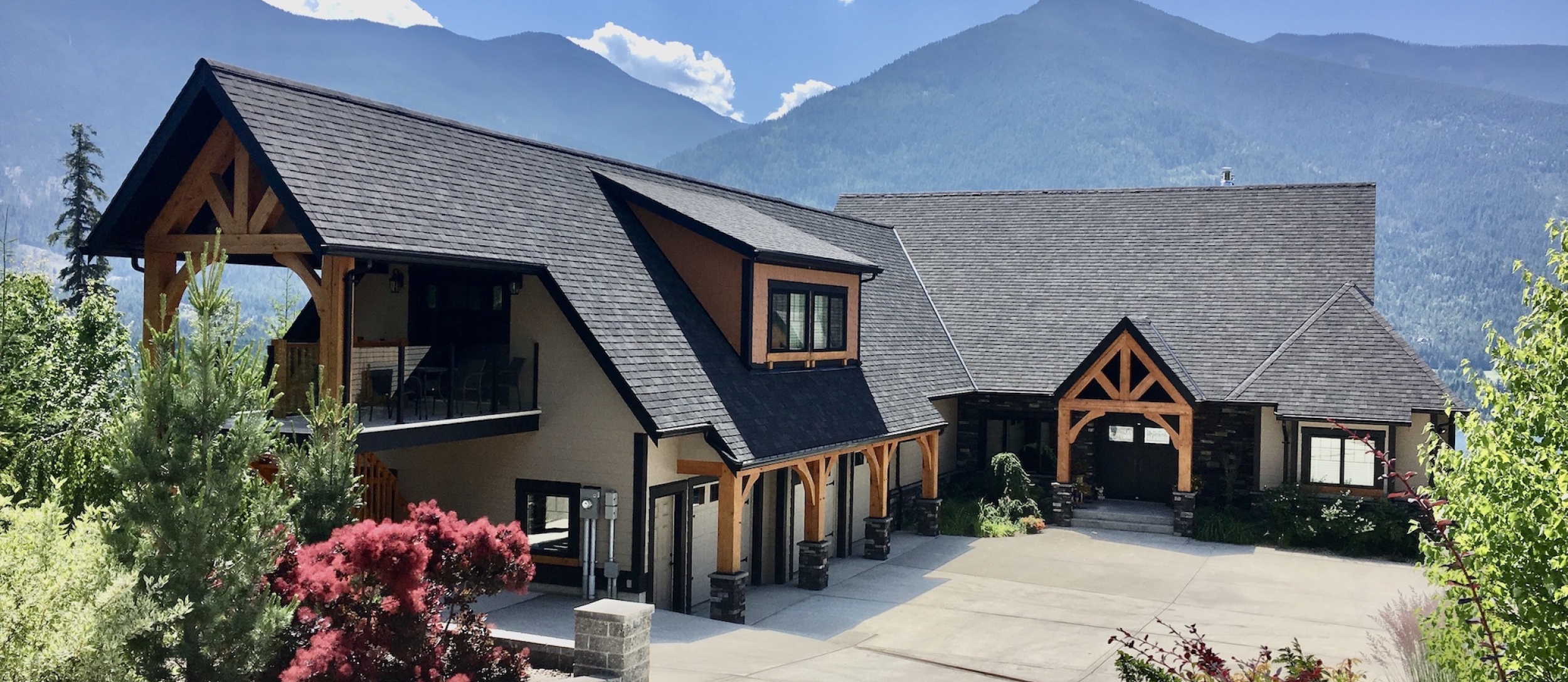 Kootenay wild guest suites with lake and mountains in the background