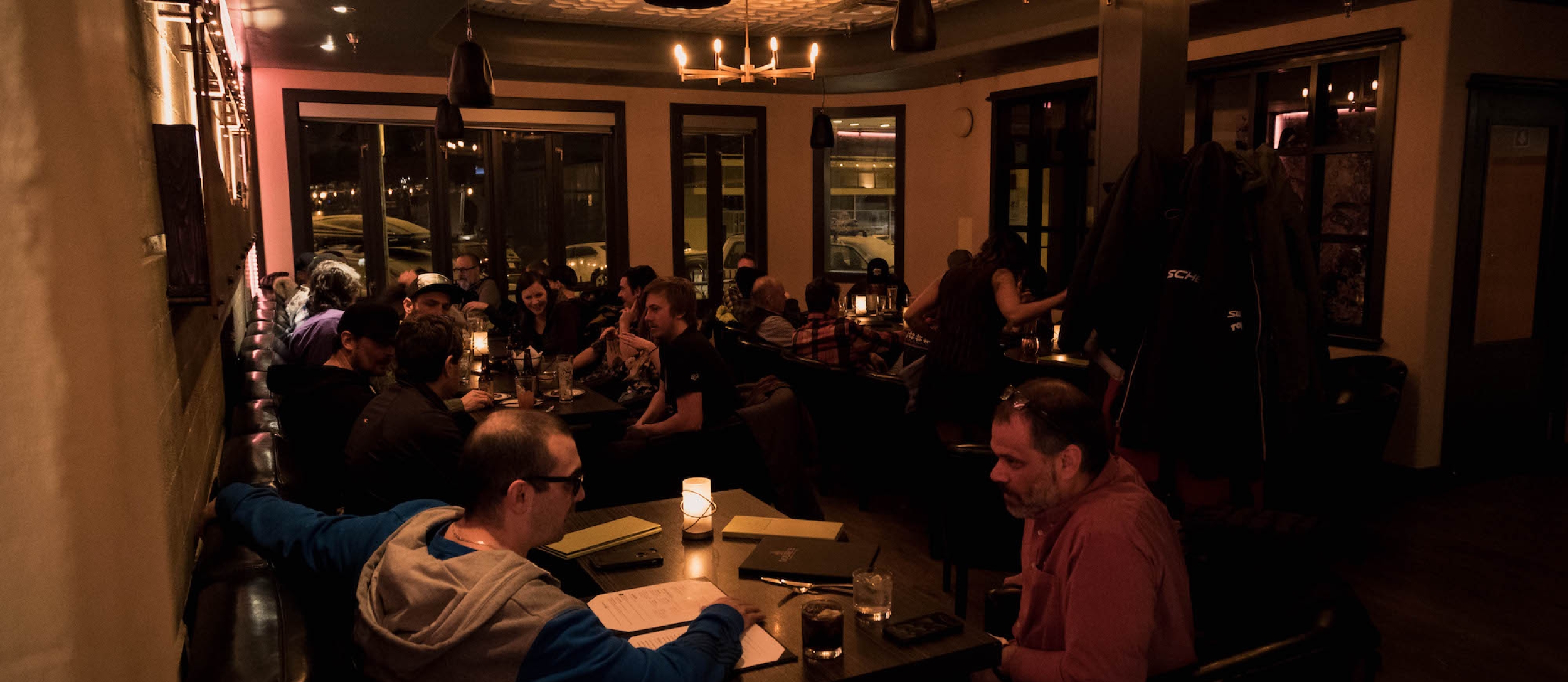 people dining in low lighting at Louie's Steakhouse