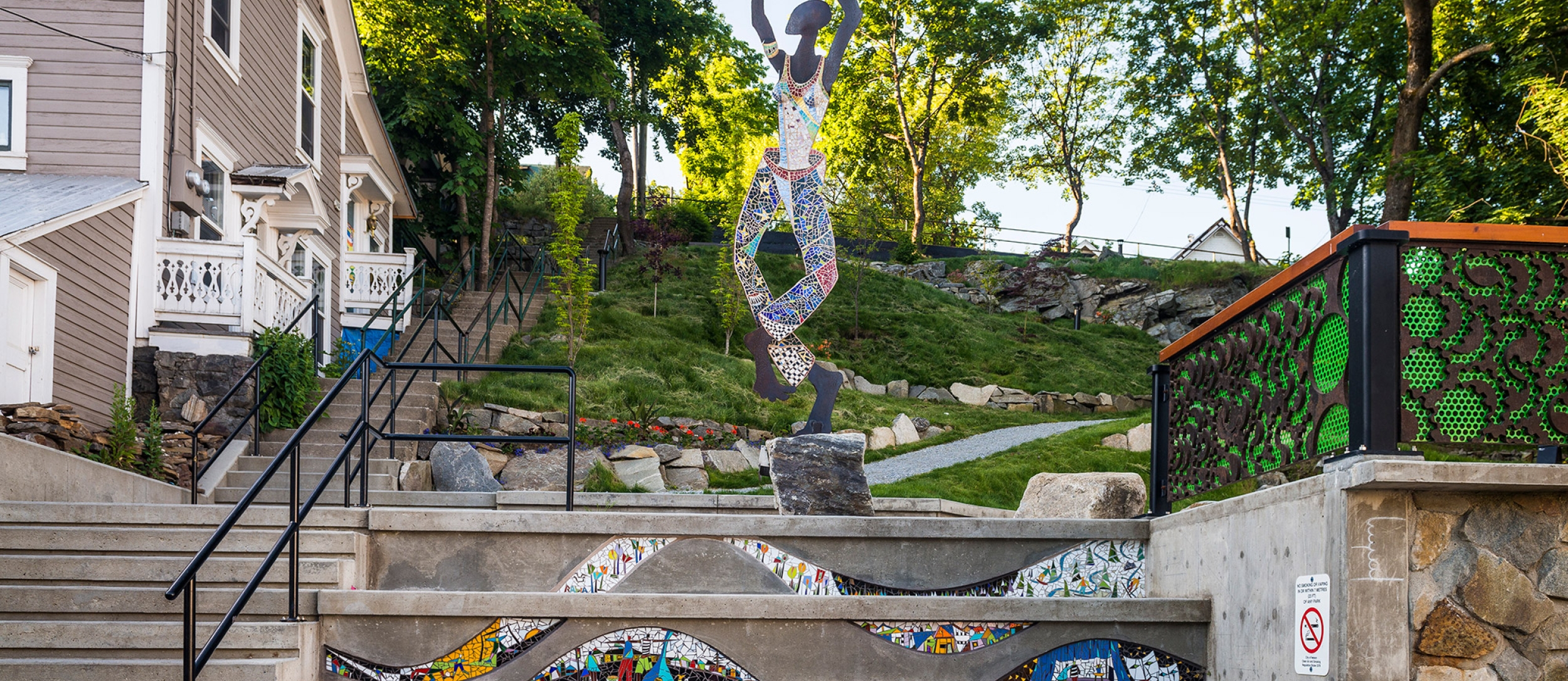 Dancing figure embellished with tile mosaic. 