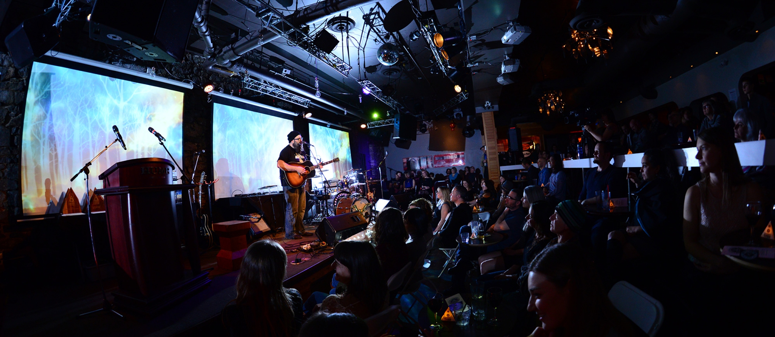 A musician playing a guitar in Spiritbar during the Kootenay Music awards